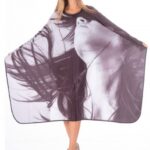 Mantella da taglio, chiusura con automatici. 150x128cm.