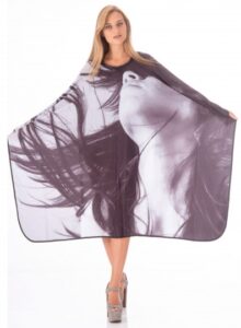 Mantella da taglio, chiusura con automatici. 150x128cm.