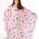 Mantelle taglio bambini rosa con animaletti e scritte